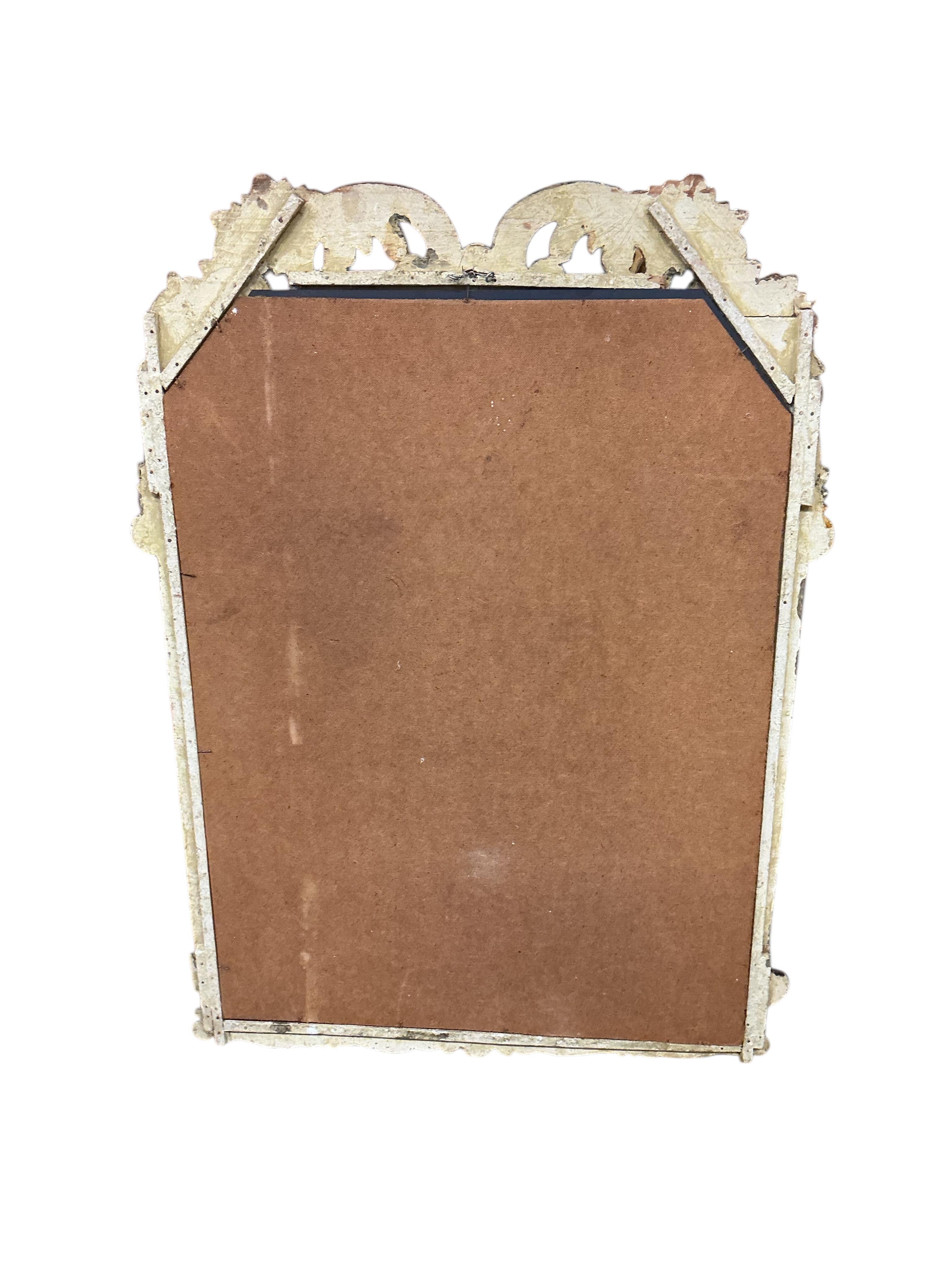 An 18th century style carved giltwood wall mirror, width 64cm, height 89cm